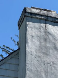 New Rochelle, NY Chimney stucco repair and paint 1