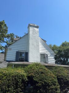 New Rochelle, NY Chimney stucco repair and paint 3