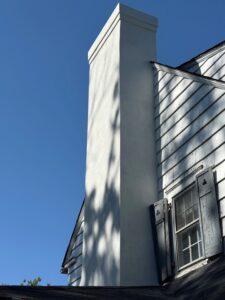 New Rochelle, NY Chimney stucco repair and paint 4